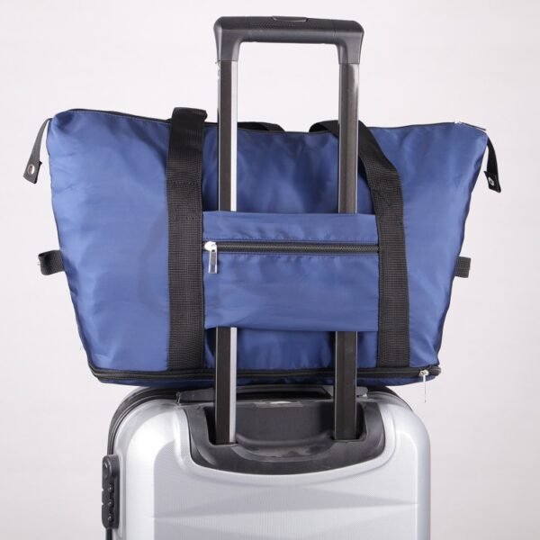 Smartsoft Travelling Bag BT3118 in black, blue, and silver – lightweight memory fabric with custom logo print area - small pocket