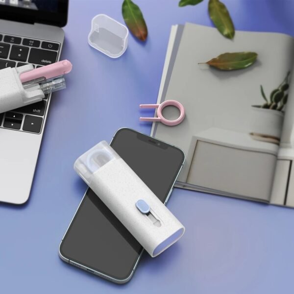 GCT02M gadget cleaning kit in white and blue with brush, sponge, and silicone tools - on the table