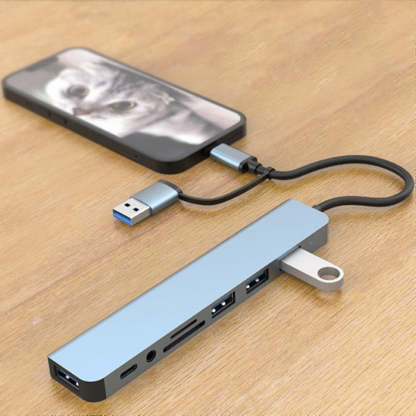 Light blue HUB08 multi-port USB hub with USB-C, USB-A, SD, TF, and 3.5mm jack - on the table