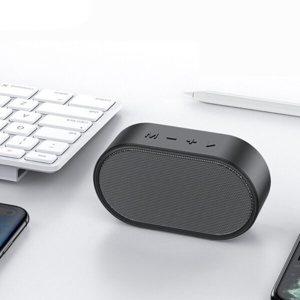 Multi function bluetooth speaker with FM, USB and built-in microphone - on the table